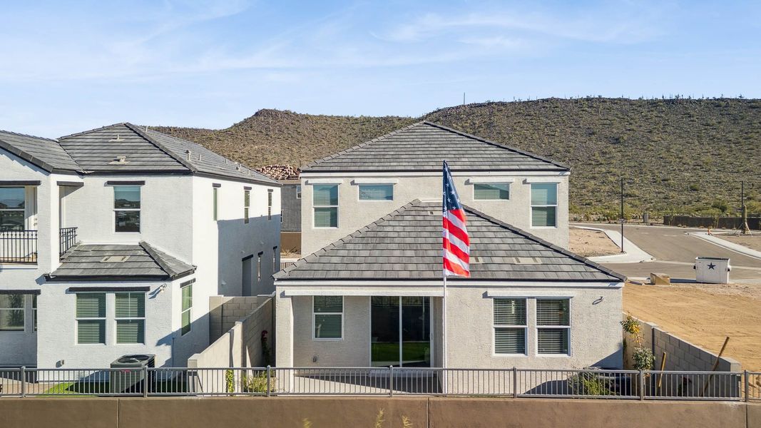 Representative exterior photo of a completed home built from the Mirage by D.R. Horton in The Buttes at Mystic, Peoria, AZ (Image 31).