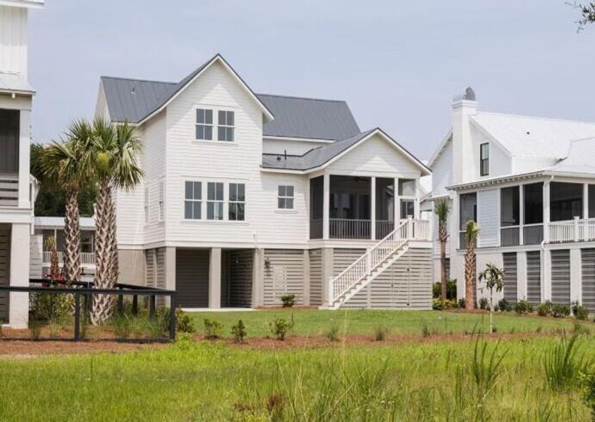 Front exterior of a new home in , Charleston, SC, highlighting curb appeal (Image 1). Front exterior of a new home in , Charleston, SC, highlighting curb appeal (Image 1).