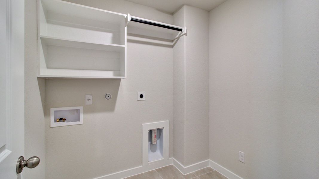 Laundry Room with Built In Shelving