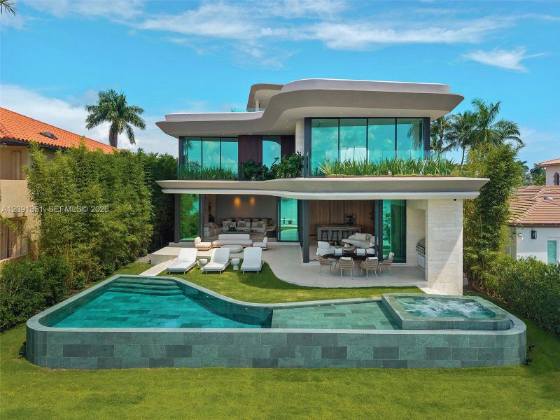 Exterior details and patio area of a home in , Miami Beach (Image 26). Exterior details and patio area of a home in , Miami Beach (Image 26).