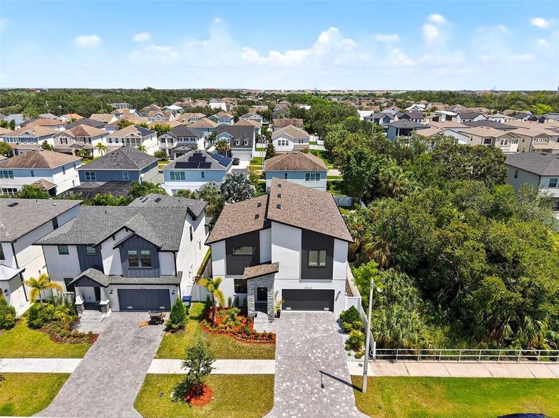 Front exterior of a new home in , Tampa, FL, highlighting curb appeal (Image 26).