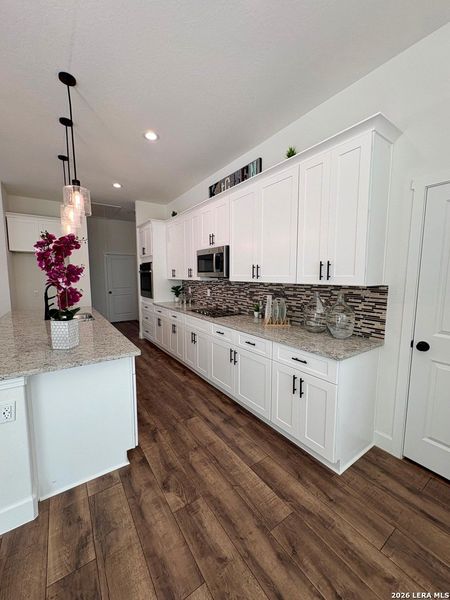 Furnished interior view inside a new home in , Spring Branch (Image 10).