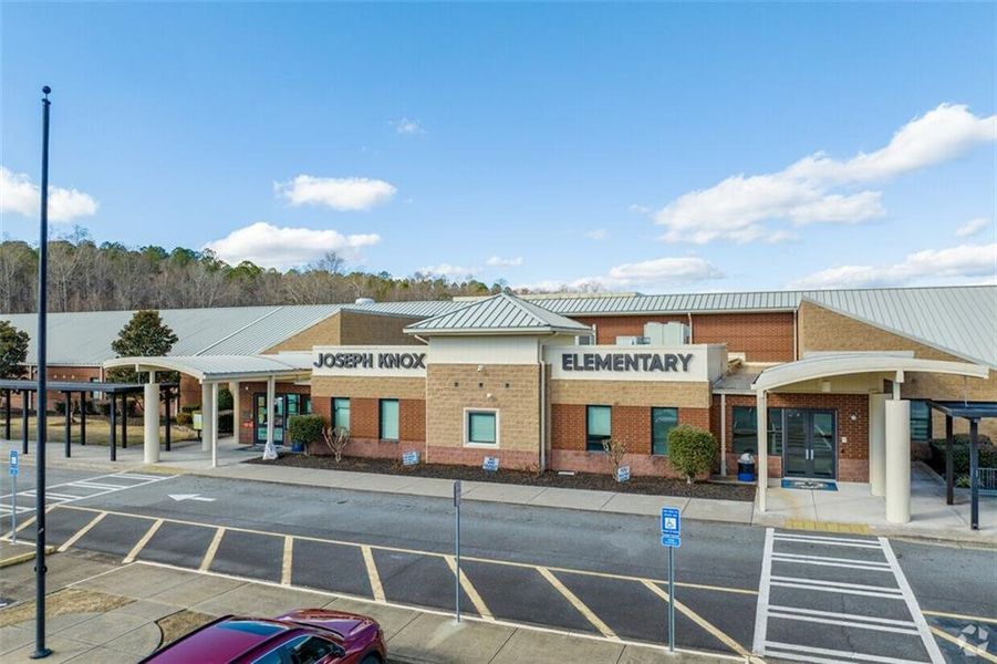 Front exterior of a new home in Lakeside at River Green, Canton, GA, highlighting curb appeal (Image 9). Front exterior of a new home in Lakeside at River Green, Canton, GA, highlighting curb appeal (Image 9).