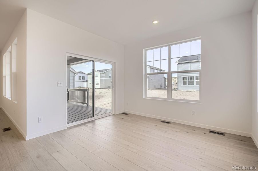 Spacious, unfurnished interior of a new home in Riano Ridge: The Monarch Collection, Loveland (Image 11).