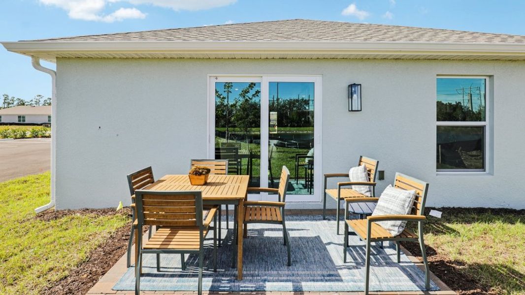 Exterior details and patio area of a home in Asher Park, Lehigh Acres (Image 21).