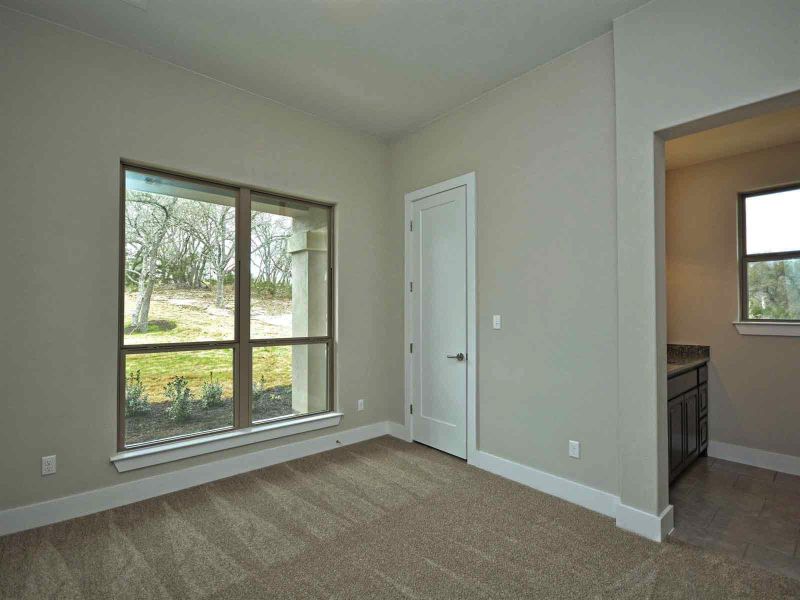 Representative unfurnished interior of a home built from the Madera II by Giddens Homes in Scofield Farms Estates, Georgetown (Image 432).