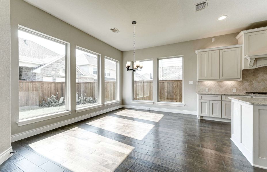 Representative unfurnished interior of a home built from the 4590 by Ravenna Homes in Artavia 70′, Conroe (Image 23).
