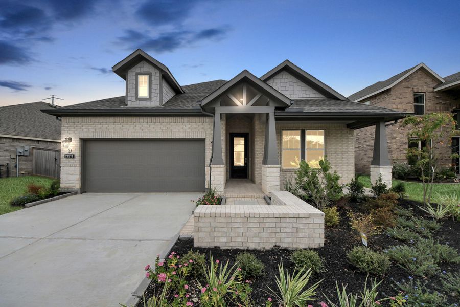 Front exterior of a new home in Bridgeland: Heritage Collection, Cypress, TX, highlighting curb appeal (Image 2).