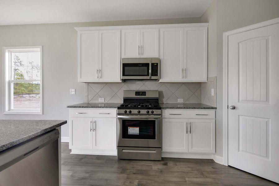 Representative furnished interior of a home built from the Springfield by Caviness & Cates Communities in Sutherland Station at Olde Liberty, Franklinton (Image 97). Representative furnished interior of a home built from the Springfield by Caviness & Cates Communities in Sutherland Station at Olde Liberty, Franklinton (Image 97).