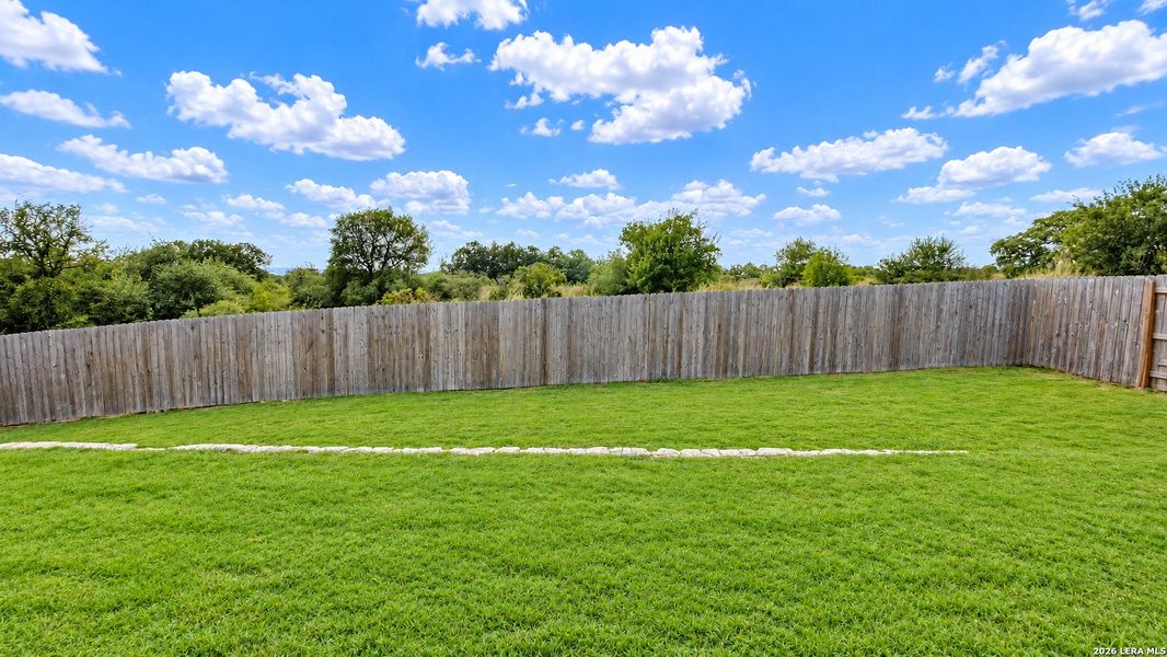 Exterior details and patio area of a home in Potranco West, Castroville (Image 21).