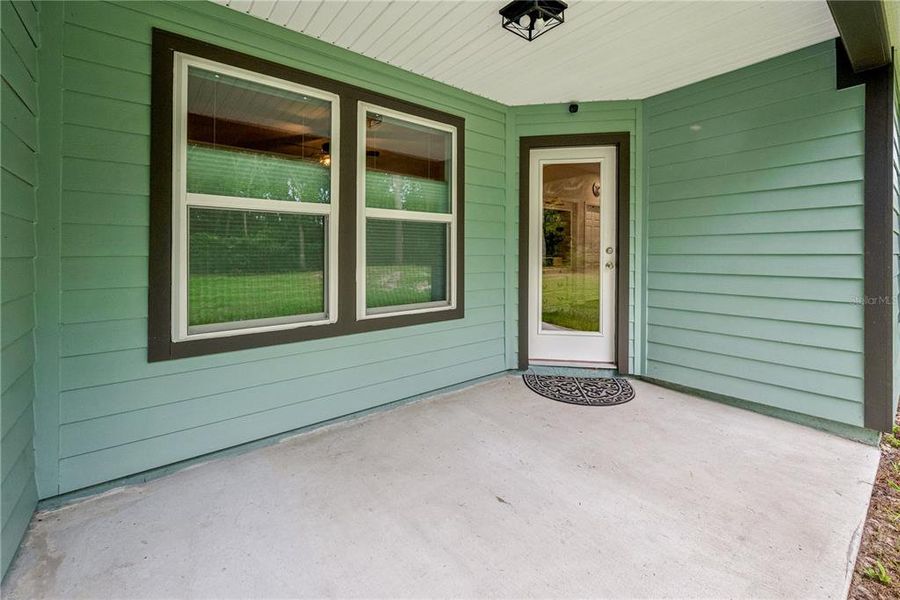 Exterior details and patio area of a home in , Satsuma (Image 3). Exterior details and patio area of a home in , Satsuma (Image 3).