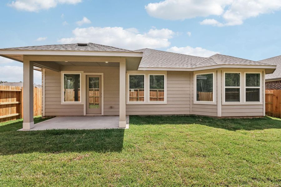 Exterior details and patio area of a home in Stewart's Ranch, Conroe (Image 3). Exterior details and patio area of a home in Stewart's Ranch, Conroe (Image 3).