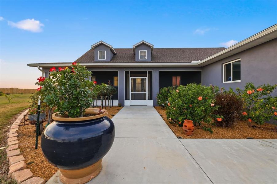 Front exterior of a new home in , Dade City, FL, highlighting curb appeal (Image 25).