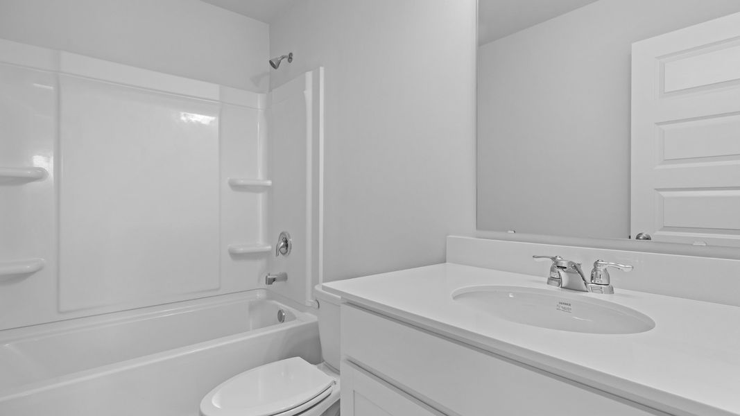 Representative furnished interior of a home built from the SPRUCEWOOD by D.R. Horton in Sheep Island, Summerville (Image 11).