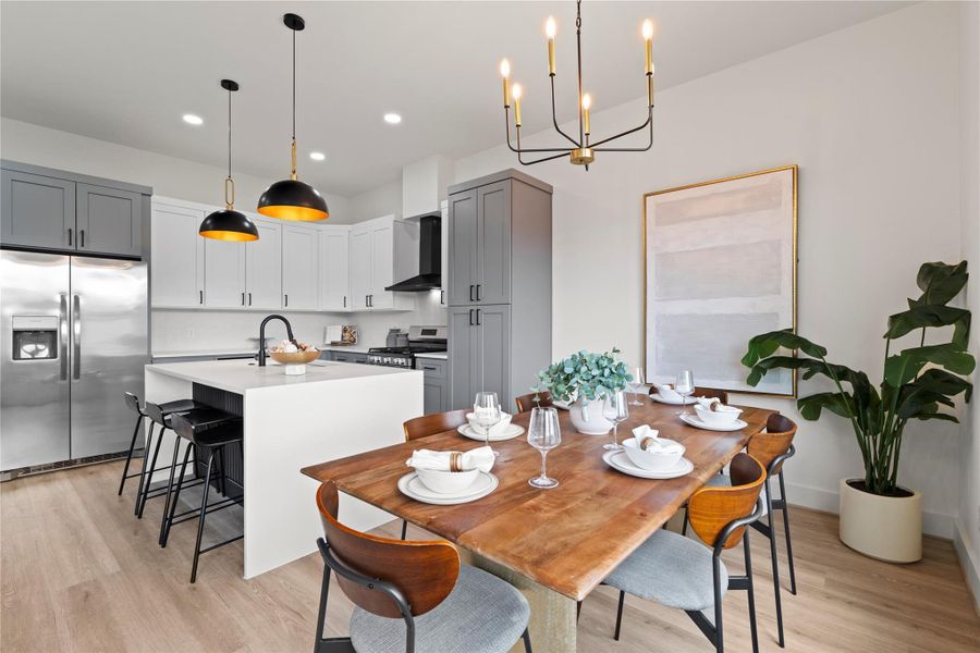 Perfectly positioned between kitchen and living, this dining space anchors the open floor plan with purpose and natural elegance.