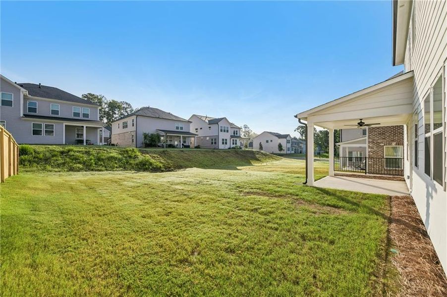 Exterior details and patio area of a home in Auburn Glen, Dacula (Image 28).