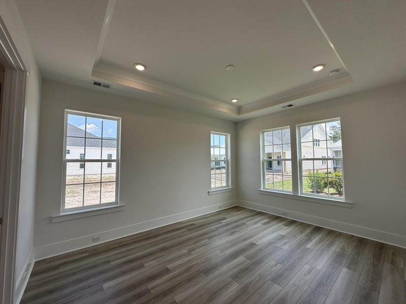 Spacious, unfurnished interior of a new home in Summerwind Crossing at Lakes of Cane Bay, Summerville (Image 7).