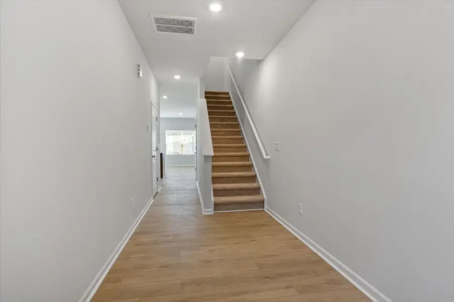 Spacious, unfurnished interior of a new home in West Main Townhomes, Sanford (Image 15).