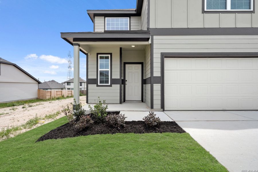 Exterior details and patio area of a home in Hickory Ridge, Elmendorf (Image 22).