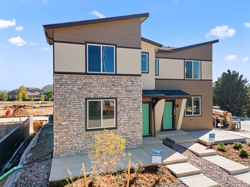 Exterior details and patio area of a home in Spring Valley, Longmont (Image 3).