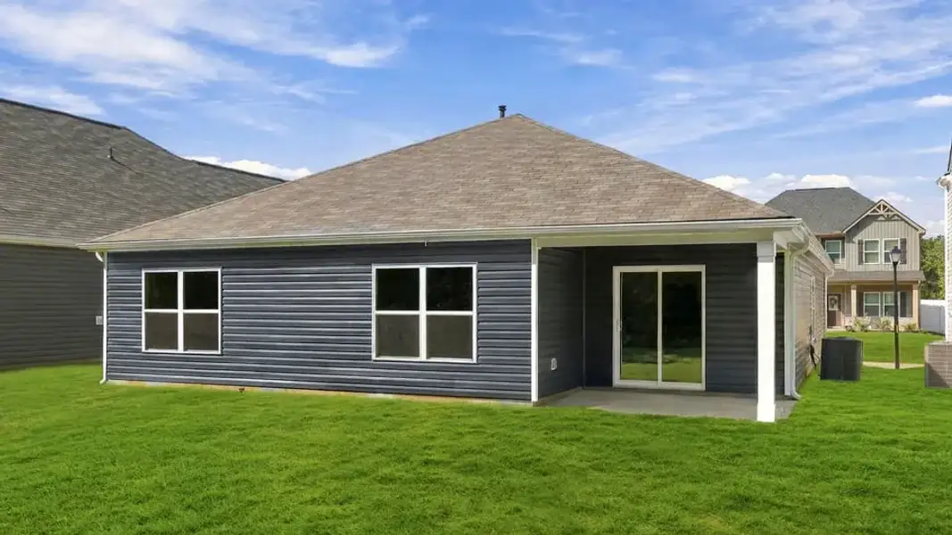 Exterior details and patio area of a home in Reedy Fork Place, Seneca (Image 4).