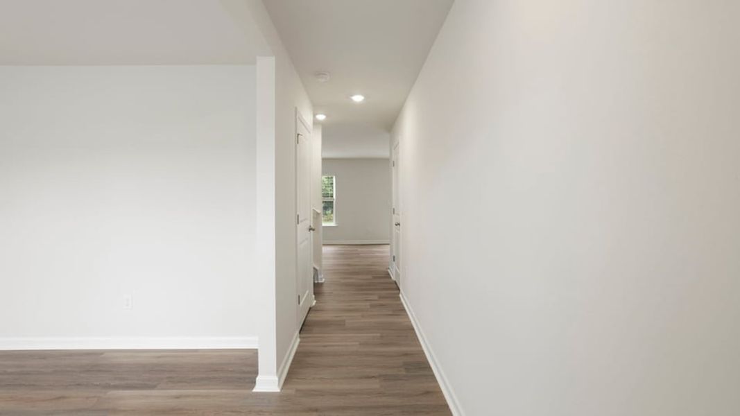 Spacious, unfurnished interior of a new home in Bentley Park, Greenwood (Image 16). Spacious, unfurnished interior of a new home in Bentley Park, Greenwood (Image 16).