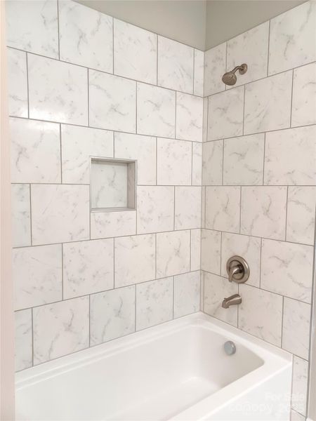 Details!  All tile bath with recesssed niche
