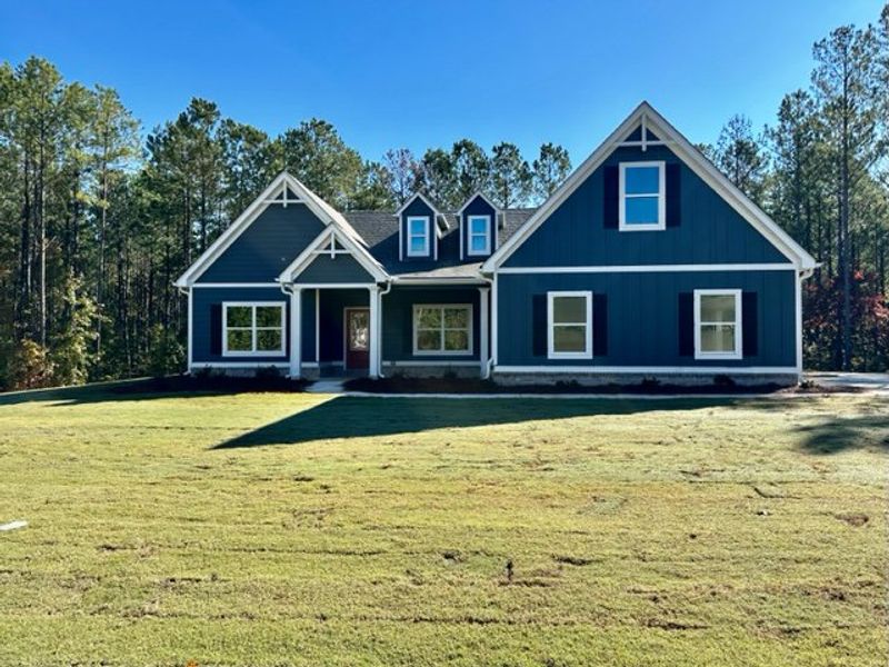 Front exterior of a new home in Triple Park, Moreland, GA, highlighting curb appeal (Image 1). Front exterior of a new home in Triple Park, Moreland, GA, highlighting curb appeal (Image 1).