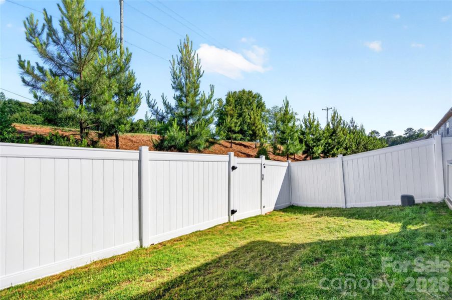 Access gate for lawn mower.