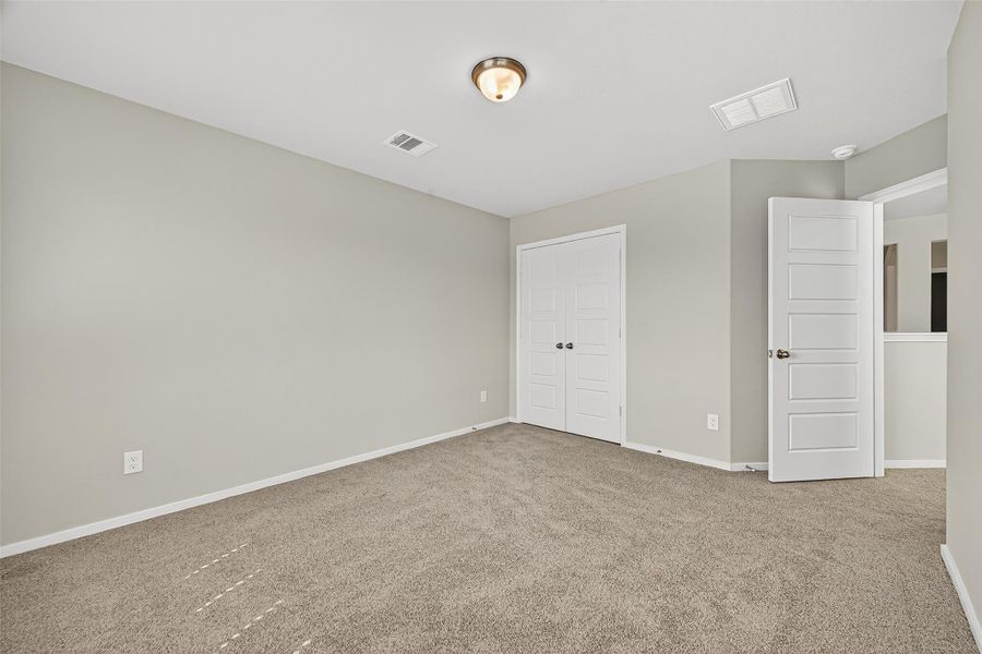 Spacious, unfurnished interior of a new home in Sunterra, Katy (Image 37).