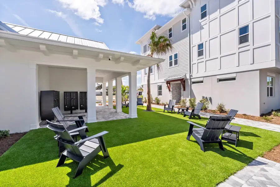 Exterior details and patio area of a home in EvenTide, New Smyrna Beach (Image 18).
