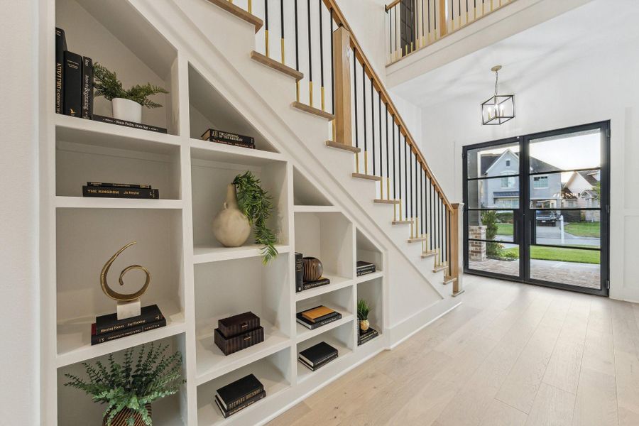 So many custom touches throughout, including the shelving under the staircase So many custom touches throughout, including the shelving under the staircase