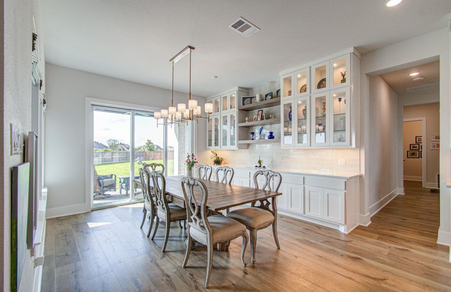 Furnished interior view inside a new home in , Manvel (Image 11).
