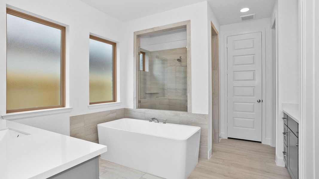 Furnished interior view inside a new home in Harvest Green, Richmond (Image 6).