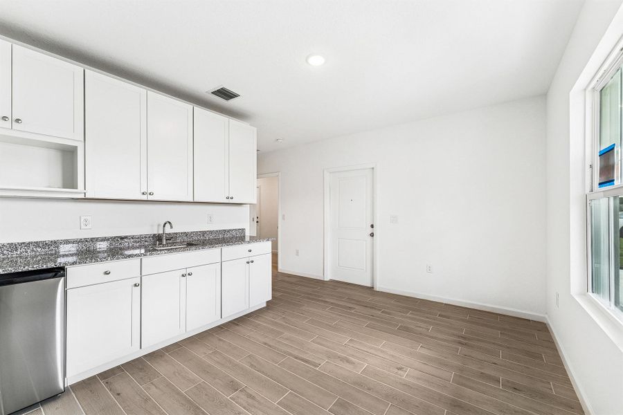 Furnished interior view inside a new home in , Port St. Lucie (Image 10).