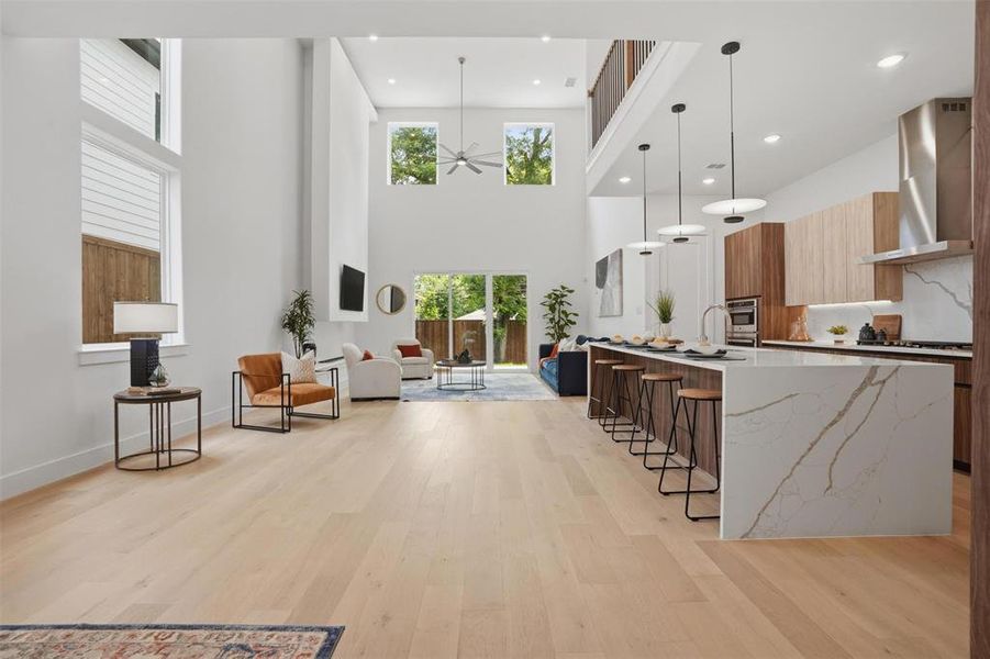 Soaring double-height ceilings, a linear fireplace, and European oak hardwood floors * the kind of living space that stops buyers in their tracks Soaring double-height ceilings, a linear fireplace, and European oak hardwood floors * the kind of living space that stops buyers in their tracks