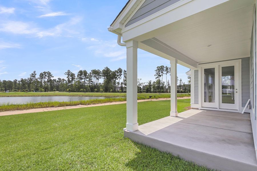 Exterior details and patio area of a home in Tidewater at Lakes of Cane Bay, Summerville (Image 3). Exterior details and patio area of a home in Tidewater at Lakes of Cane Bay, Summerville (Image 3).