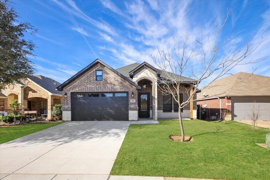 Front exterior of a new home in , Fort Worth, TX, highlighting curb appeal (Image 1). Front exterior of a new home in , Fort Worth, TX, highlighting curb appeal (Image 1).