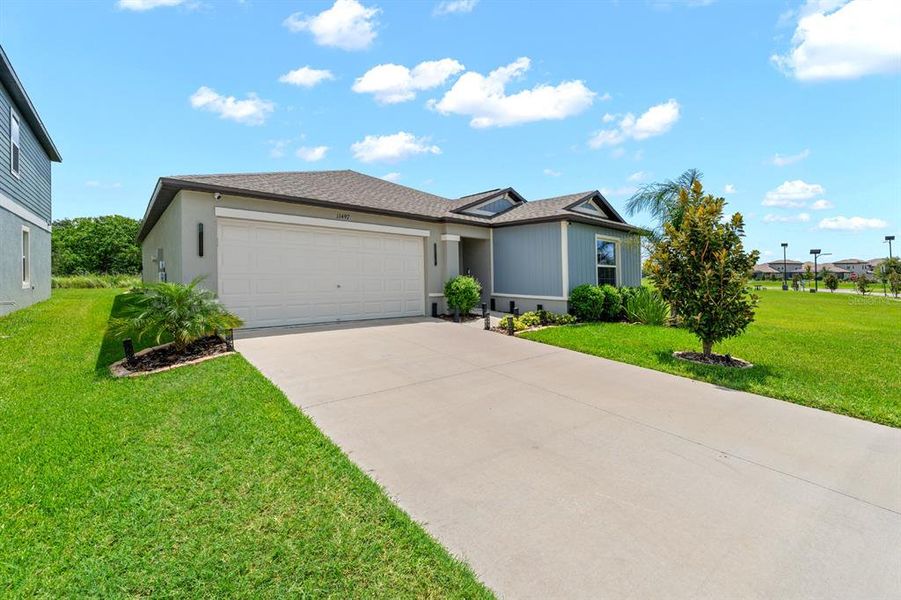 Front exterior of a new home in Mirada, San Antonio, FL, highlighting curb appeal (Image 21).