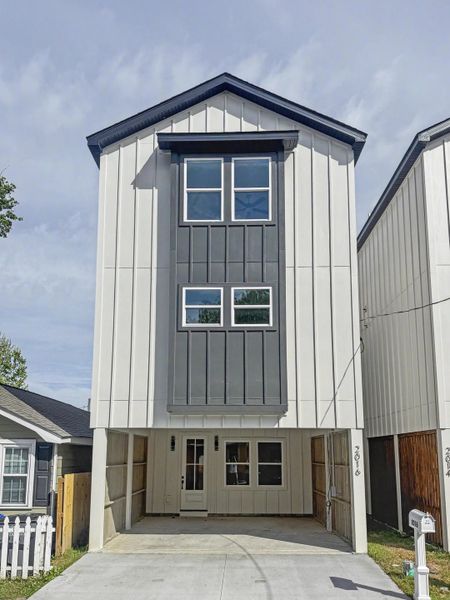 Front exterior of a new home in , North Charleston, SC, highlighting curb appeal (Image 1). Front exterior of a new home in , North Charleston, SC, highlighting curb appeal (Image 1).