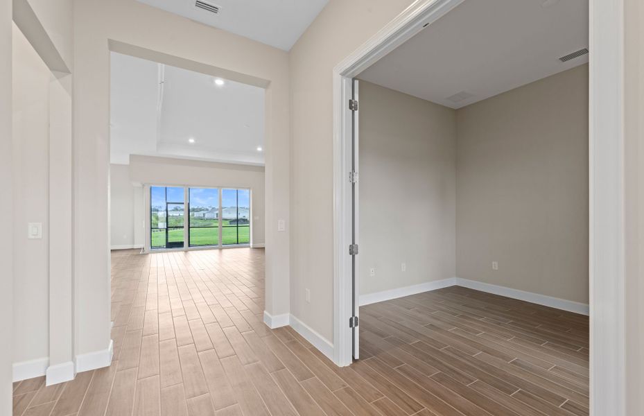 Spacious, unfurnished interior of a new home in Del Webb Oak Creek, North Fort Myers (Image 54).