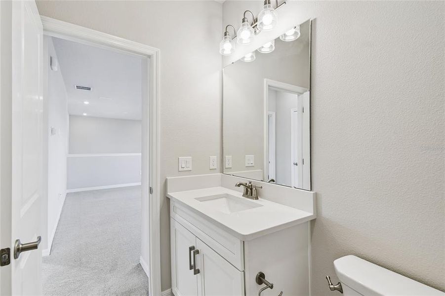 Furnished interior view inside a new home in Weslyn Park in Sunbridge 34', St. Cloud (Image 26).