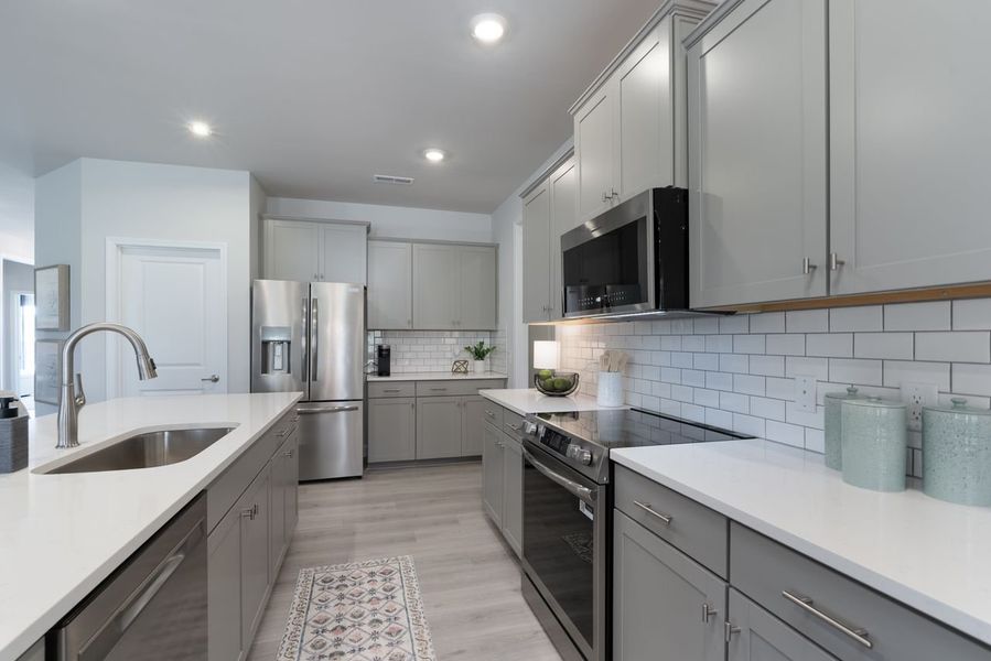 Representative furnished interior of a home built from the 3327 by Adams Homes in The Fields of Walnut Creek, Pendergrass (Image 18).