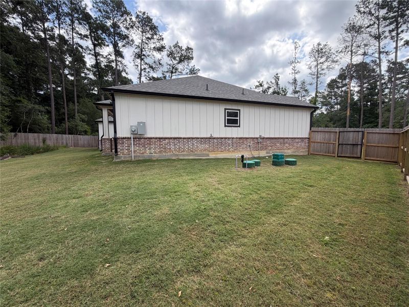 Exterior details and patio area of a home in , Magnolia (Image 24).