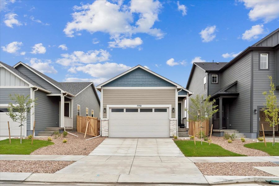 Front exterior of a new home in Aspen Meadows-4, Colorado Springs, CO, highlighting curb appeal (Image 2). Front exterior of a new home in Aspen Meadows-4, Colorado Springs, CO, highlighting curb appeal (Image 2).