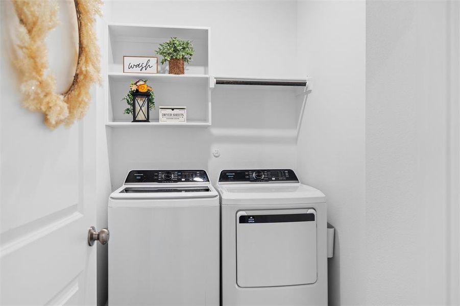 Laundry area with washer and dryer Laundry area with washer and dryer