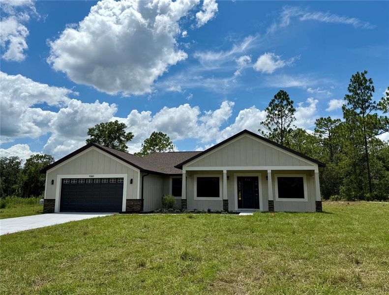 Front exterior of a new home in , Dunnellon, FL, highlighting curb appeal (Image 30).