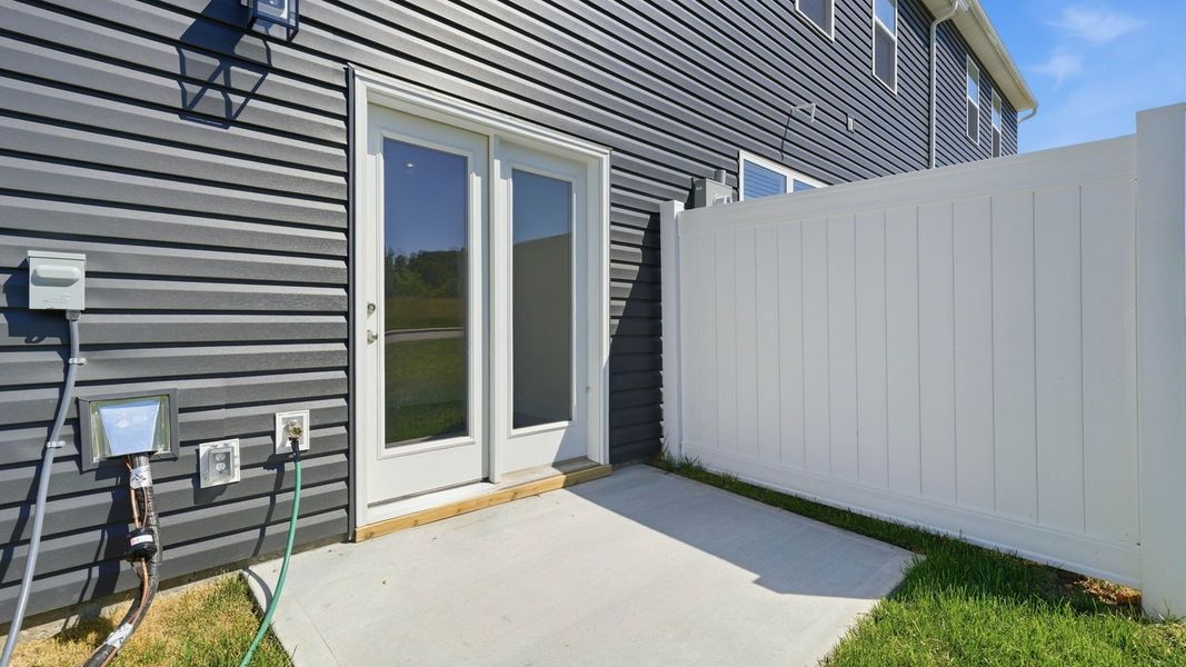 Exterior details and patio area of a home in The Arbor Townhomes, Kingsport (Image 4).
