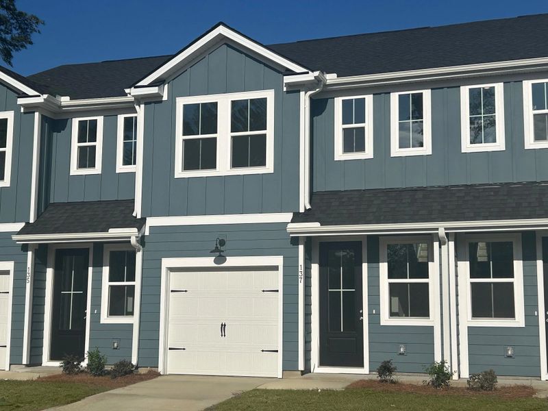 Front exterior of a new home in Windward Village, Summerville, SC, highlighting curb appeal (Image 14).