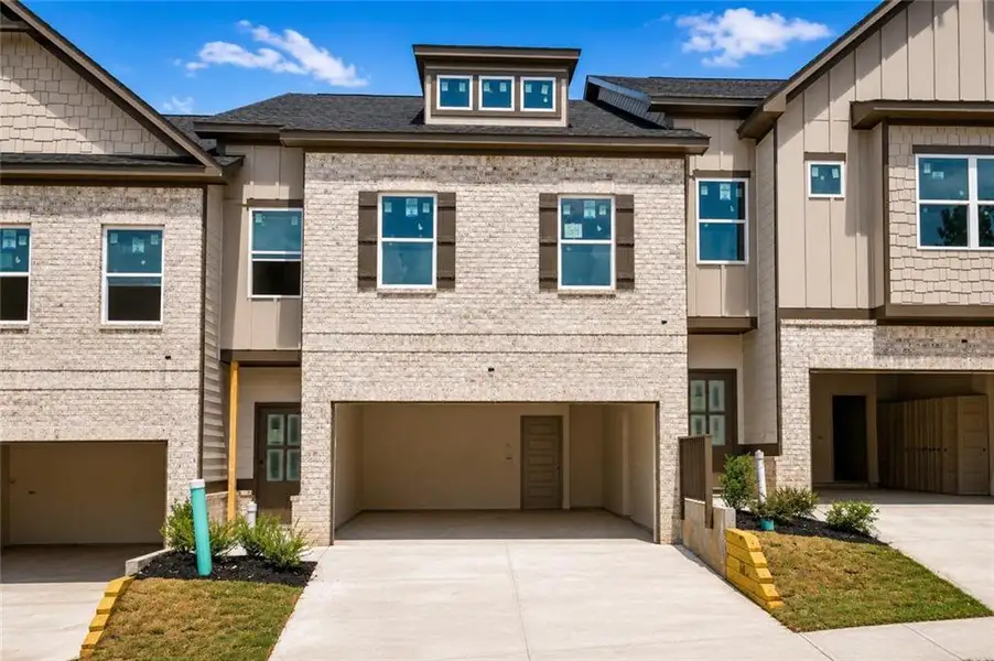 Front exterior of a new home in , Norcross, GA, highlighting curb appeal (Image 2). Front exterior of a new home in , Norcross, GA, highlighting curb appeal (Image 2).